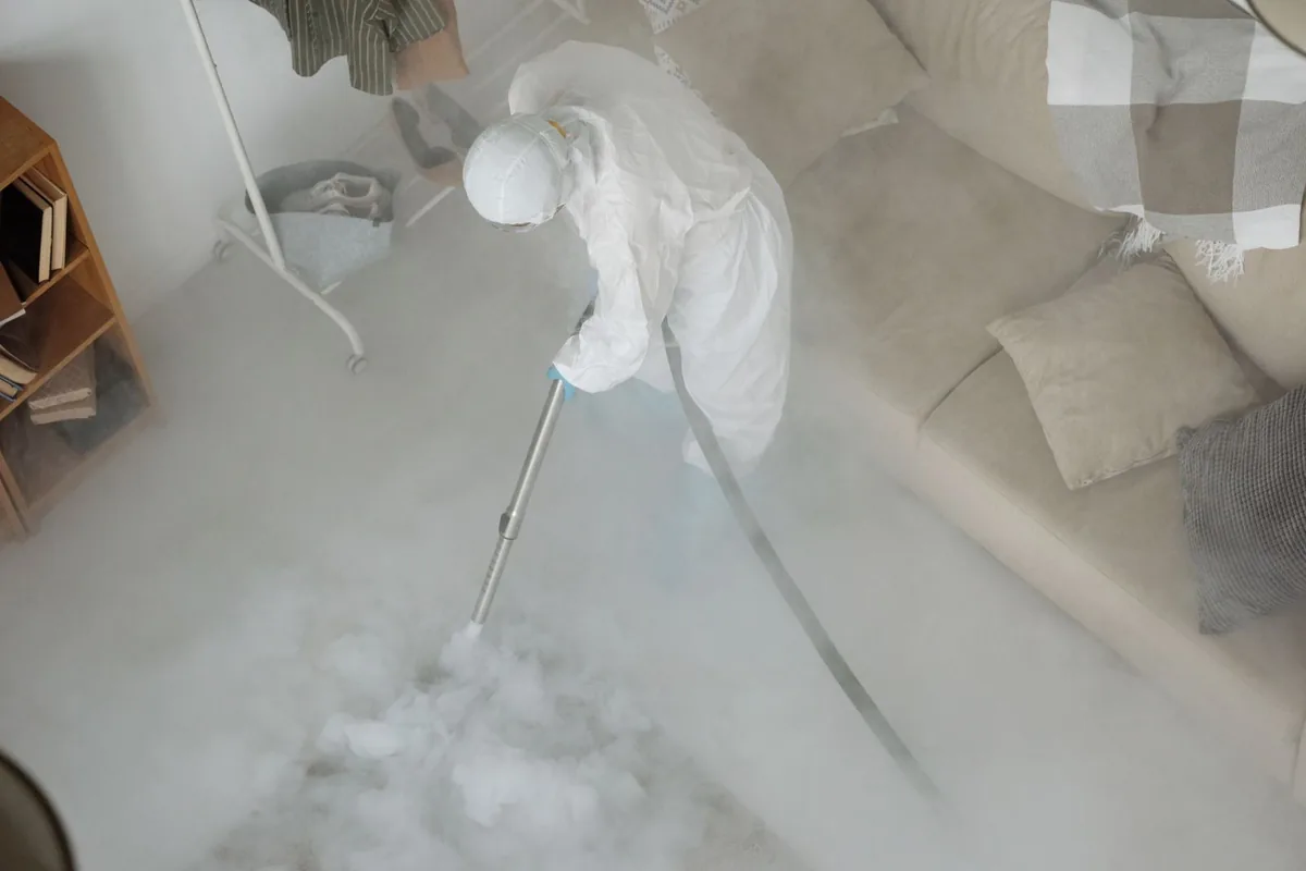 Biohazard cleanup technician in protective equipment, Leesburg, VA